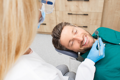 Man-Dental-Chair-Smiling